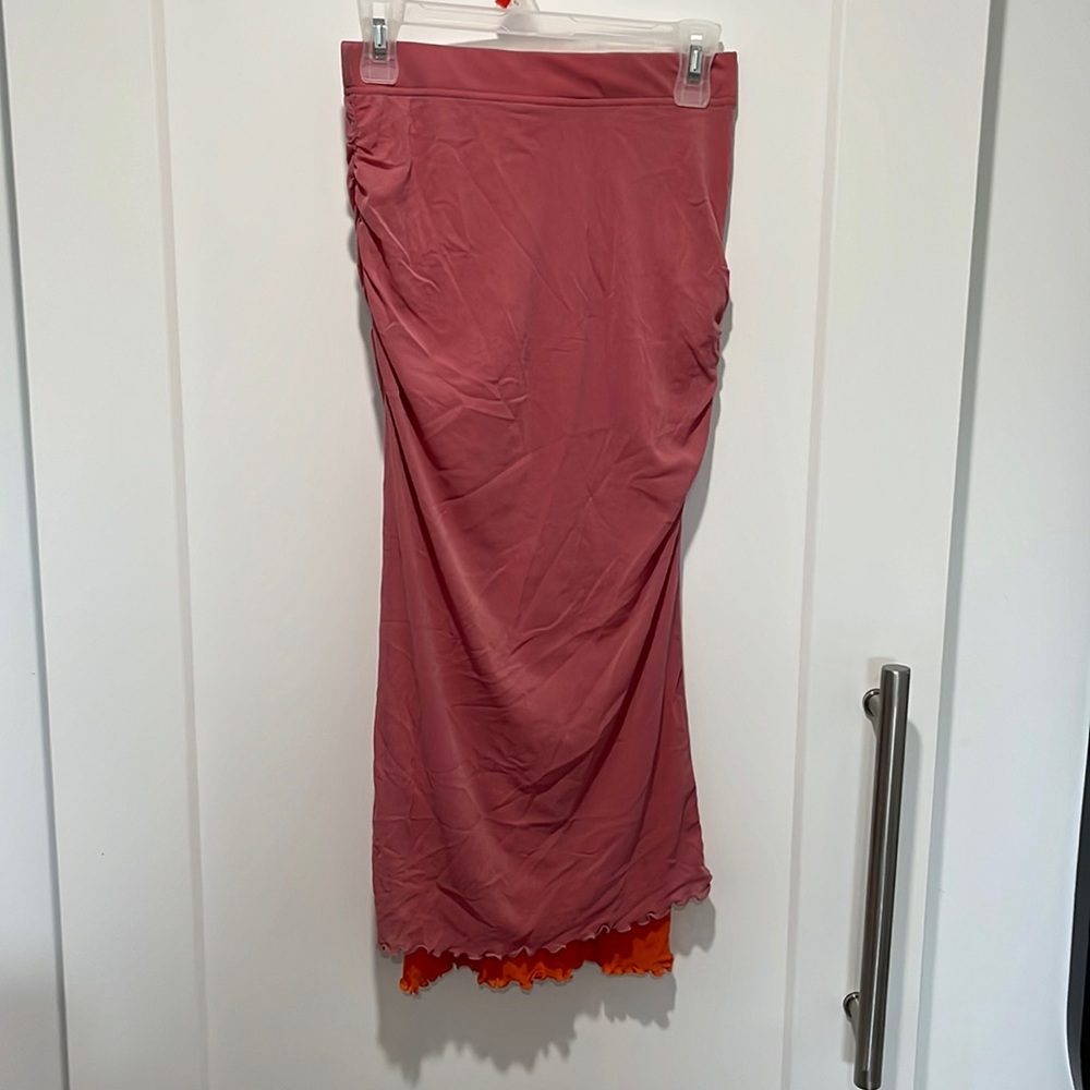 Pink overlayed orange, light weight, side ruched skirt from free people.